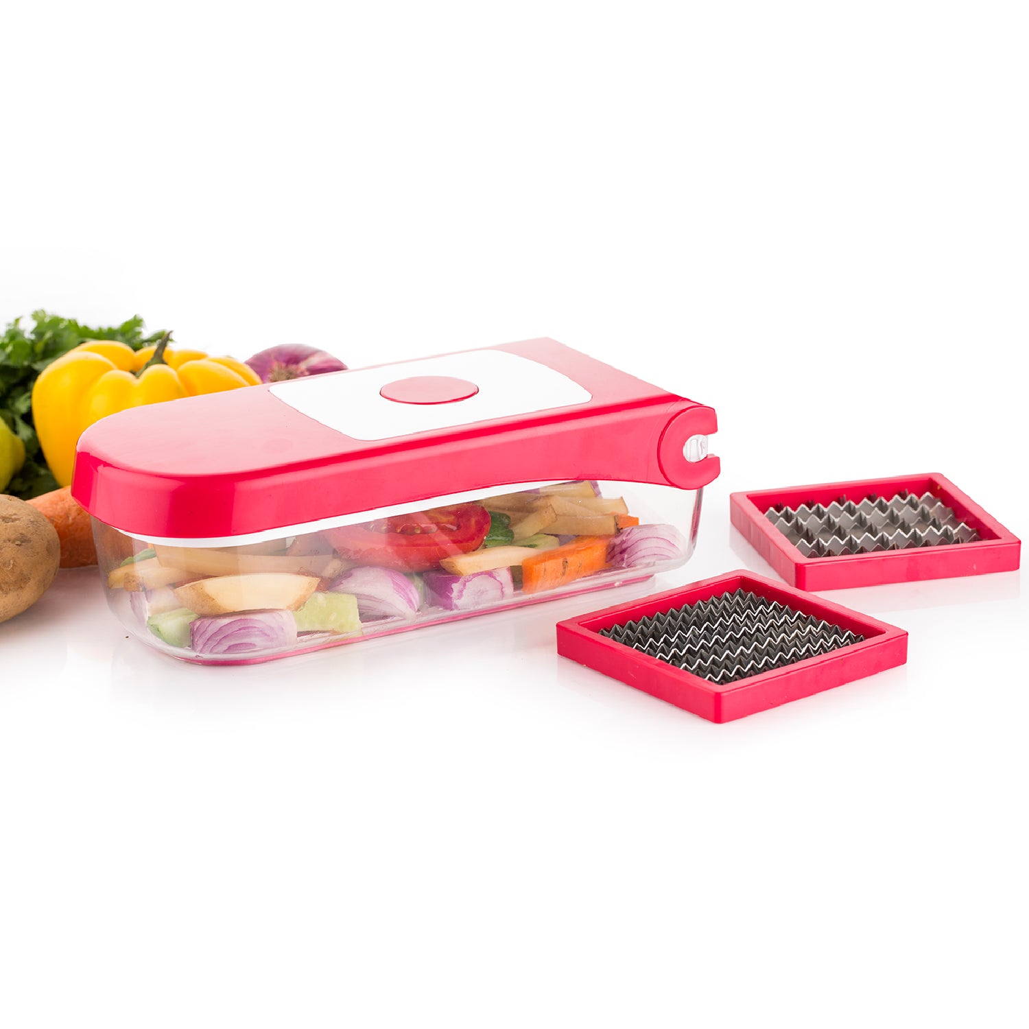 Red Wukusy Ganesh plastic vegetable and fruit chopper with a handle and blade for easy chopping of produce.