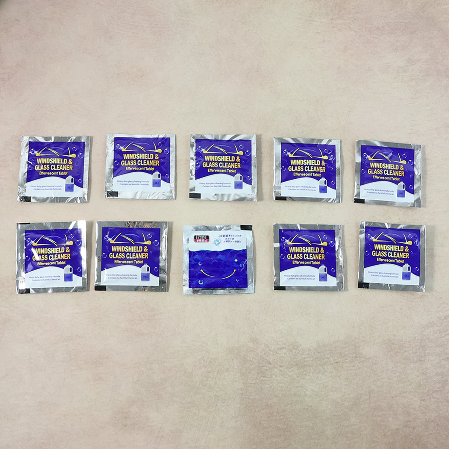 Wukusy car wiper detergent effervescent tablets in a pack of 10, dissolving in water to clean vehicle windshields effectively.