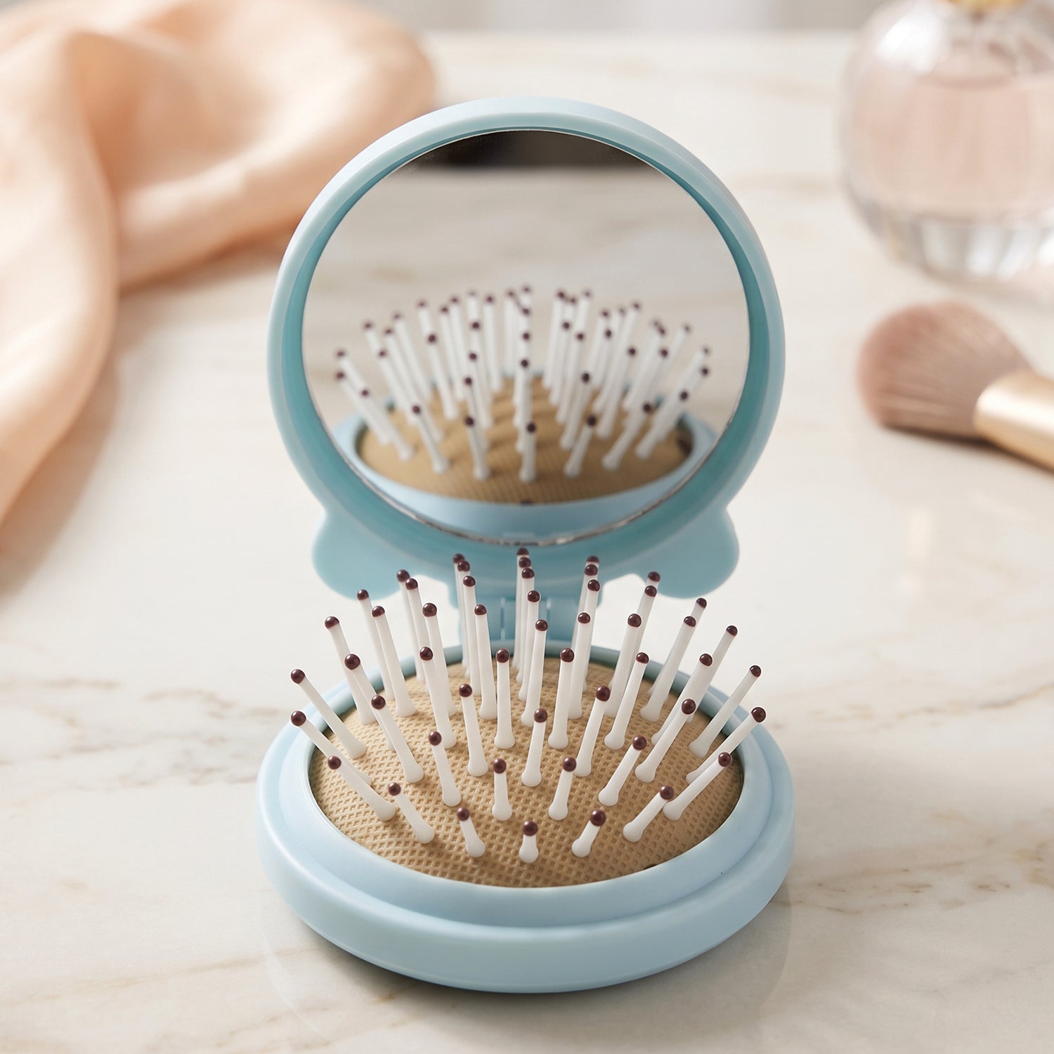 Wukusy 2-in-1 folding hair brush with mirror, compact pop-up travel hairbrush, black plastic with mirror and foldable design