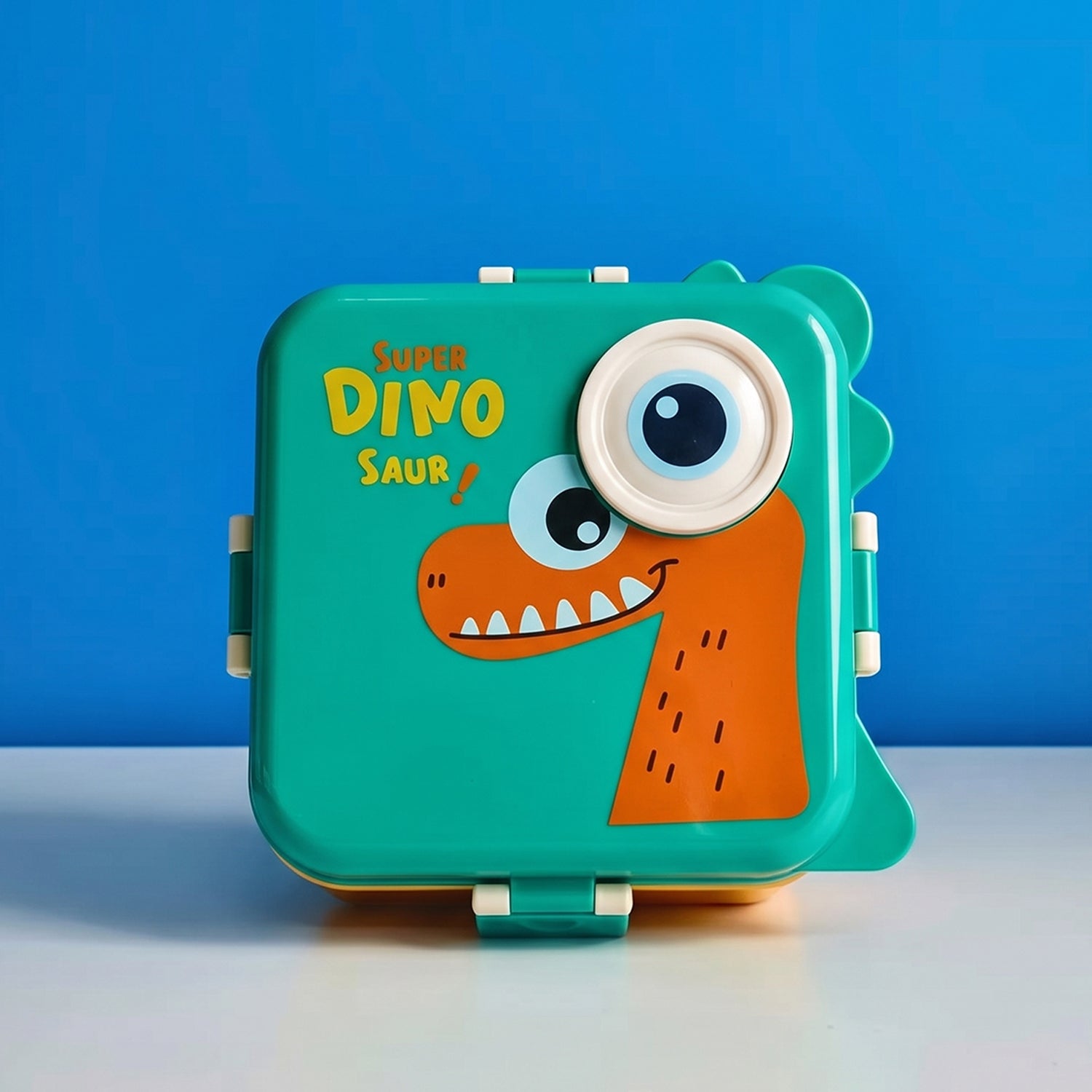 Steel kids dinosaur lunch box set by Wukusy with tray, spoon, and sauce cup, featuring colorful dinosaur design for children's meals.