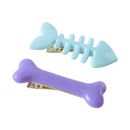 Set of four Wukusy fishbone-shaped bone hair clips, stylish and cute accessories for hair styling.