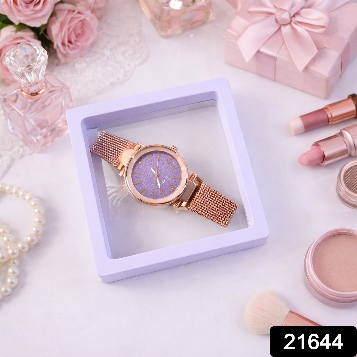 Elegant women's Wukusy analog wrist watch with a display box, featuring a stylish round dial and classic design.