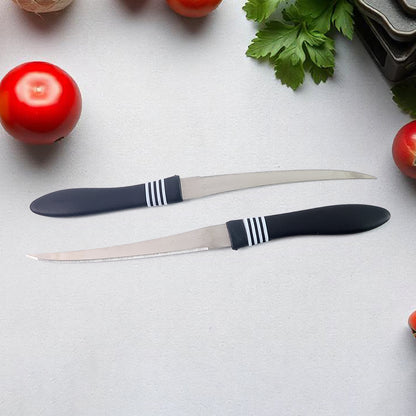 Wukusy premium curved serrated stainless steel kitchen knife set with two colorful knives on a cutting board.