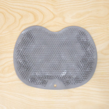 Wukusy silicone bathroom foot cleaning scrubber mat on a tiled floor, showing textured surface for foot scrubbing.