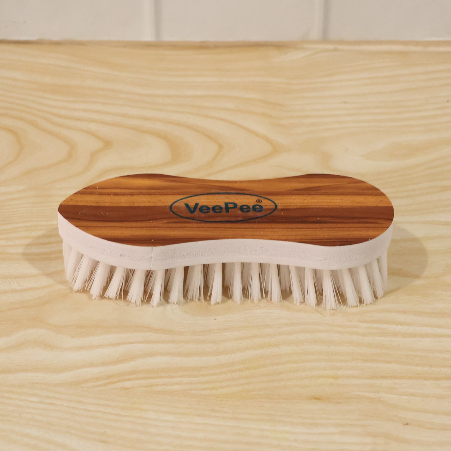 Wukusy Veepee ergonomic cloth washing brush with wooden handle and soft bristles for gentle cleaning of fabrics and clothes.