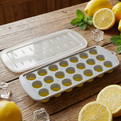 Wukusy round ball ice cube tray with lid, 21-grid ice mold for making spherical ice cubes in a kitchen or freezer.