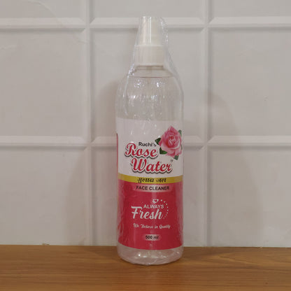 Wukusy rose water face cleanser spray bottle, 500ml, with a clear spray top and pink rose design on the bottle.