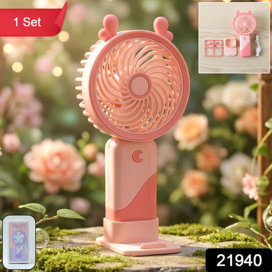 Wukusy portable USB rechargeable mini fan with LED light, compact handheld fan with adjustable settings and built-in illumination.