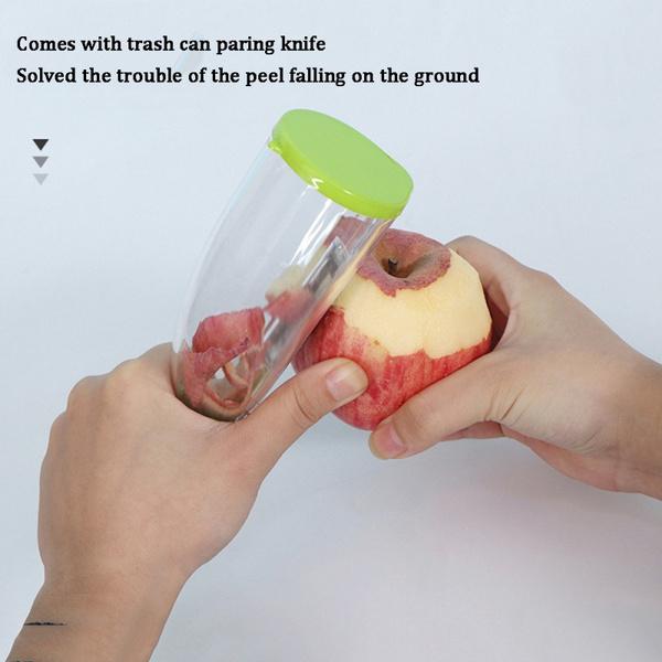 Wukusy 2404 smart multifunctional vegetable and fruit peeler, kitchen tool with ergonomic handle and stainless steel blade.