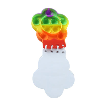 Colorful Rainbow Push Bubble Pop It fidget notebook for kids by Wukusy, featuring silicone bubbles on a fun diary cover.