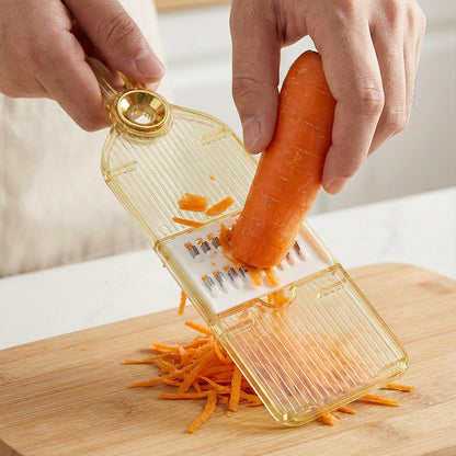 Wukusy multifunctional vegetable cutter set with interchangeable blades, showing various blades and a prepared vegetable in a kitchen.