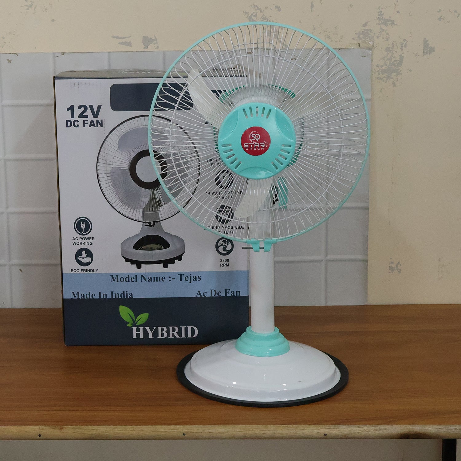 Wukusy 12V DC hybrid pedestal table fan with plug, IEC C13 power cable, showing the fan and power connection.