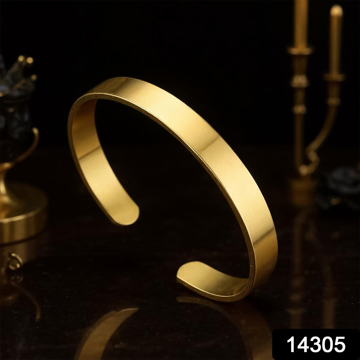 Elegant gold finish open cuff bracelet by Wukusy featuring a sleek, minimalist design for fashionable wristwear.