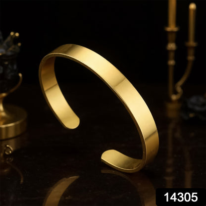 Elegant gold finish open cuff bracelet by Wukusy featuring a sleek, minimalist design for fashionable wristwear.