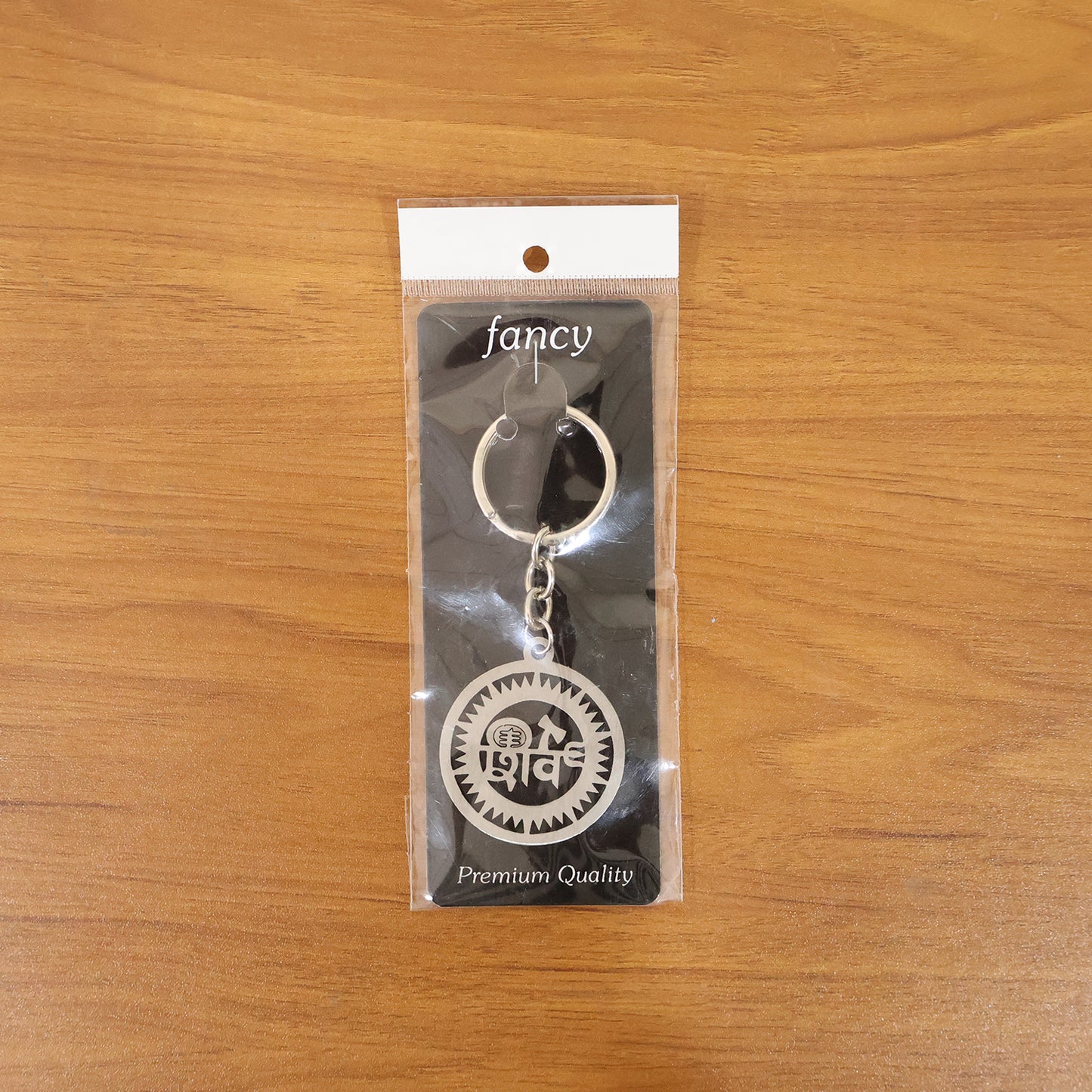 Premium metal round Shiv keychain by Wukusy featuring a sleek circular design and detailed Shiv emblem.