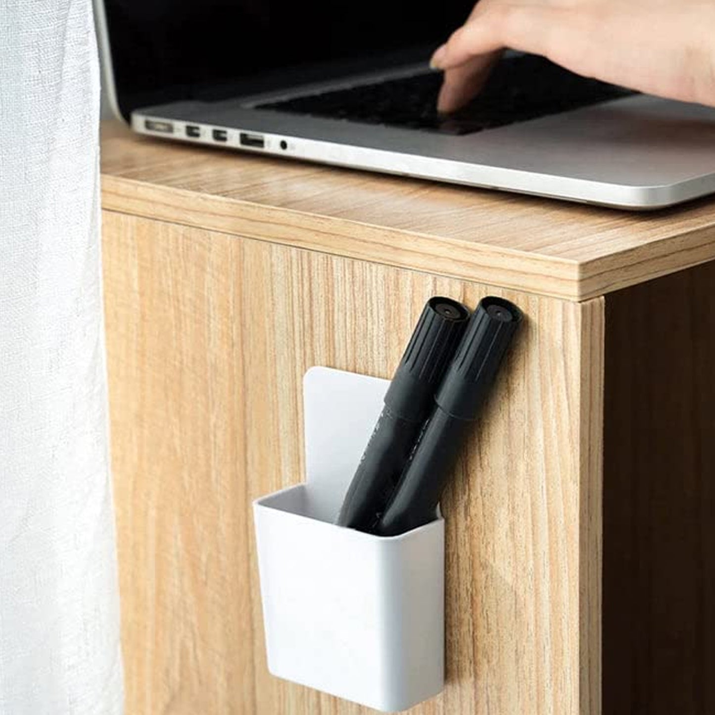 Wukusy 8485 multipurpose plastic wall-mounted remote and mobile holder stand, shown in a pack of four, mounted on a wall.