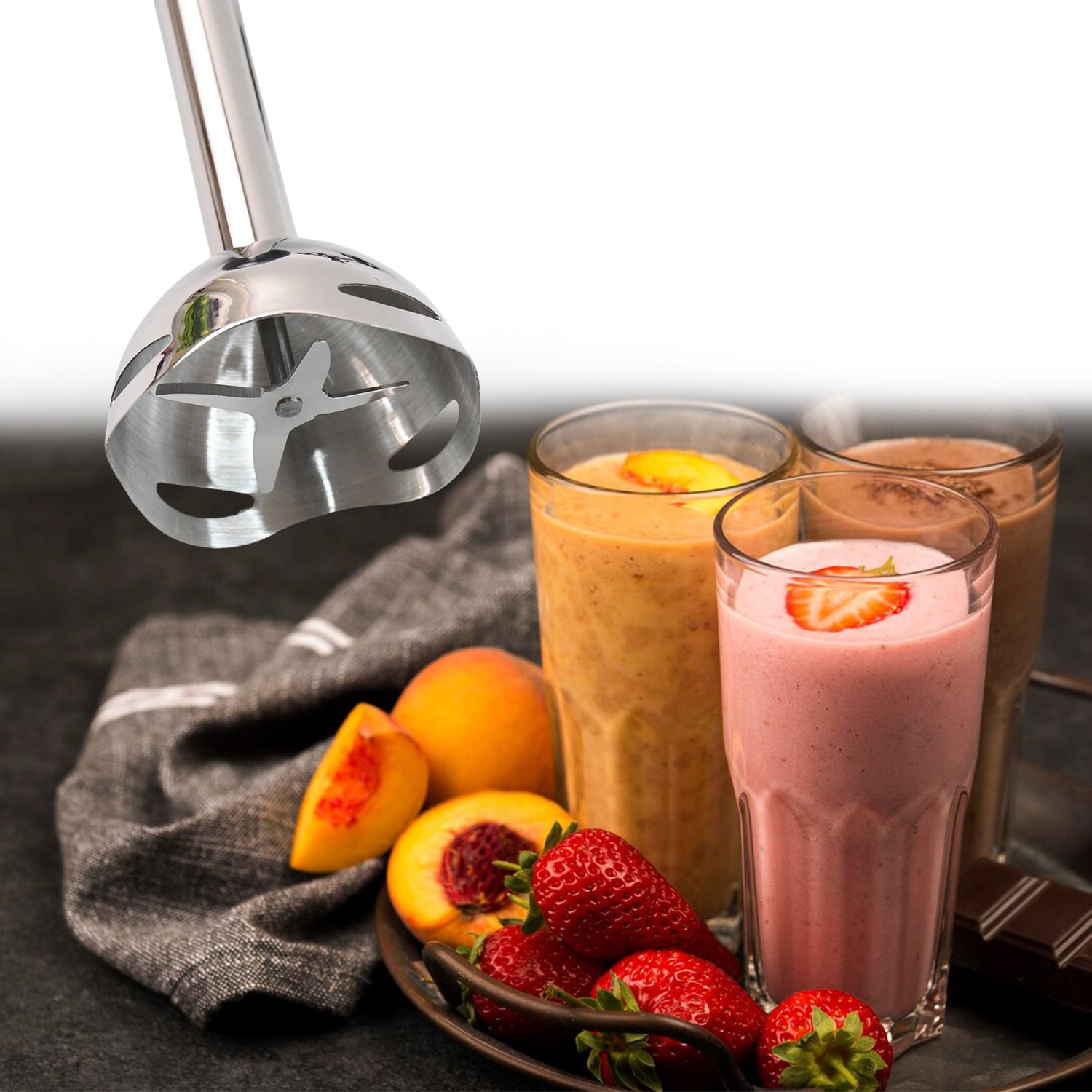 Wukusy stainless steel handheld emulsion blender with four-blade blade, 1500W, shown in a kitchen setting.