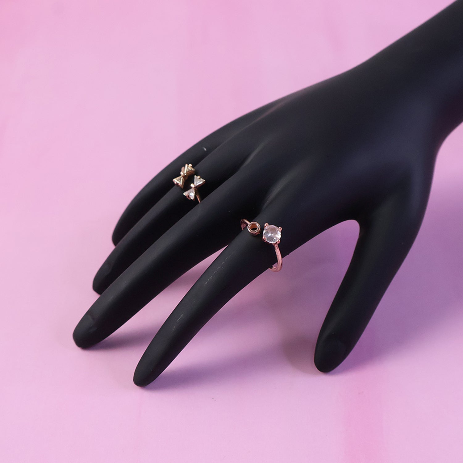 Black hand-shaped jewelry display stand by Wukusy, showcasing rings and bracelets on a sleek, elegant jewelry holder.