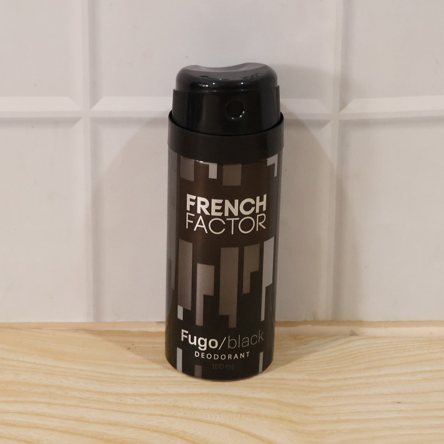 Wukusy French Factor Fugo black deodorant body spray bottle, 150ml, with sleek black packaging and spray nozzle.