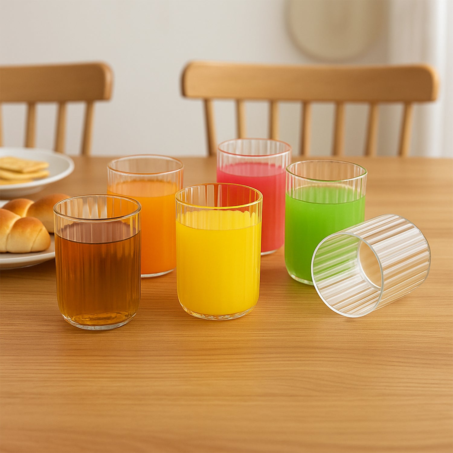 Six clear glass tumblers from Wukusy Supermom Casa 6-piece glass set, suitable for drinks in a home and kitchen setting.