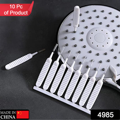 Wukusy 10-piece shower nozzle cleaning brush set with small, reusable brushes for unclogging and maintaining shower heads.