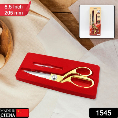 Golden stainless steel tailoring scissors by Wukusy, sharp cloth cutting scissors for professional tailoring and sewing tasks.