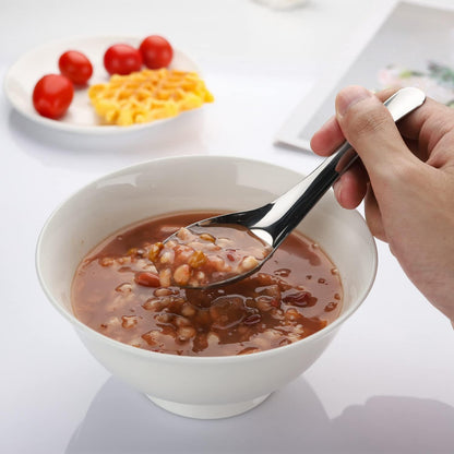 Six Wukusy Apex premium stainless steel soup spoons arranged together on a white background, showcasing their polished finish and ergonomic handles.