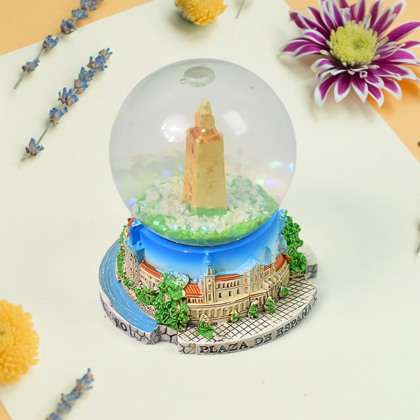 Wukusy snow globe souvenir for desk or office decoration featuring a festive winter scene inside a glass globe.