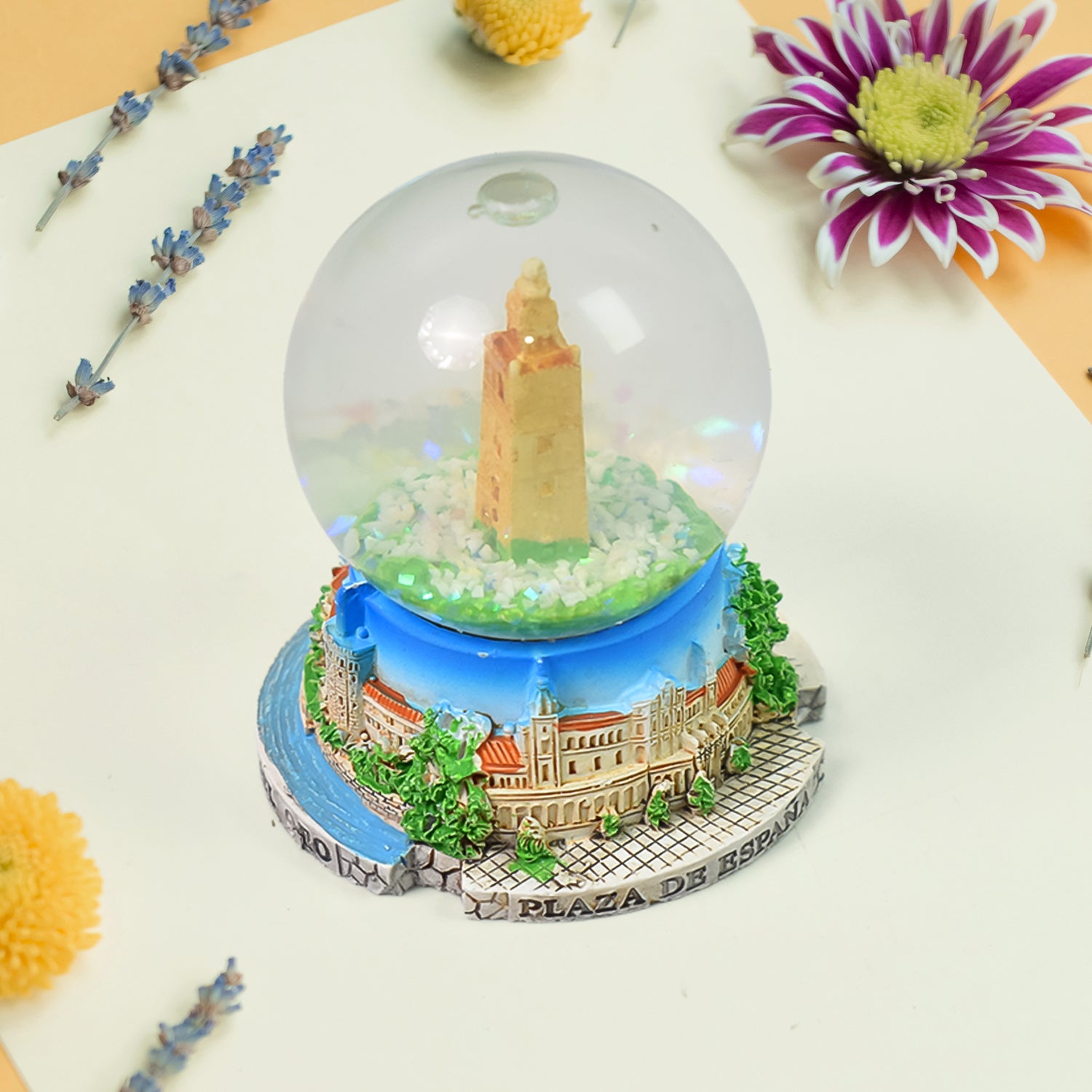 Wukusy snow globe souvenir for desk or office decoration featuring a festive winter scene inside a glass globe.