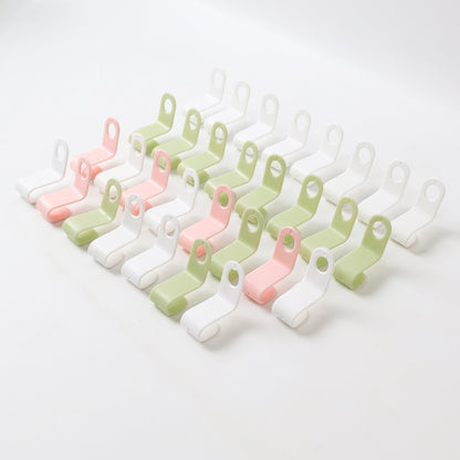 Set of 30 multi-color Wukusy hanger connector hooks for home improvement, shown connected on a wall for organizing items.