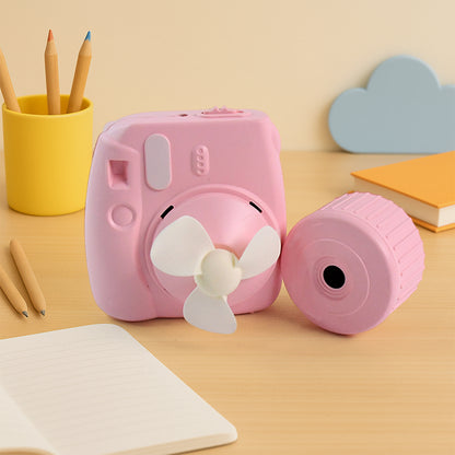 Wukusy USB mini camera-shaped fan for office, compact device with realistic camera design, ideal for desktop cooling.