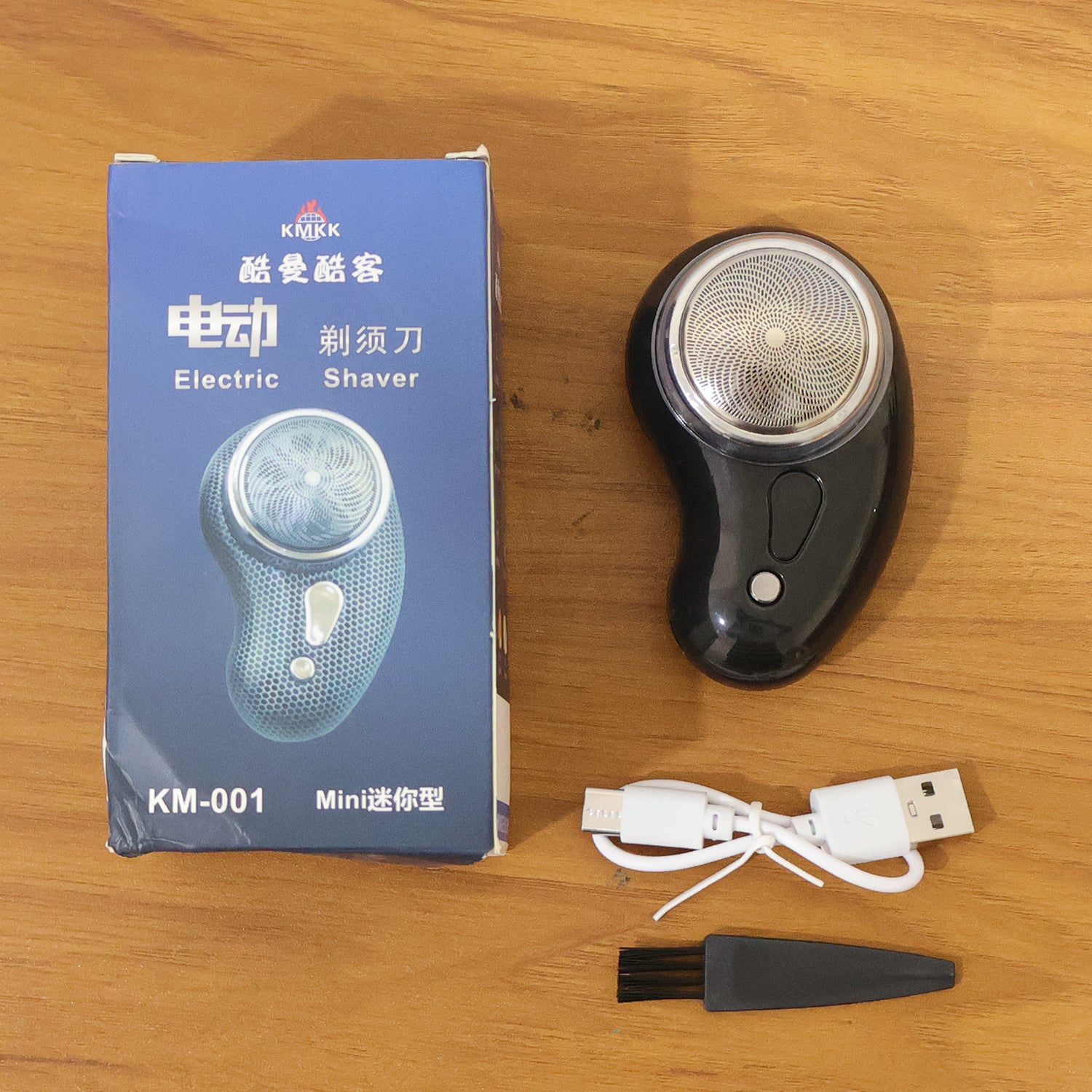 Wukusy portable electric rechargeable mini beard trimmer with compact design and precision blades for grooming.