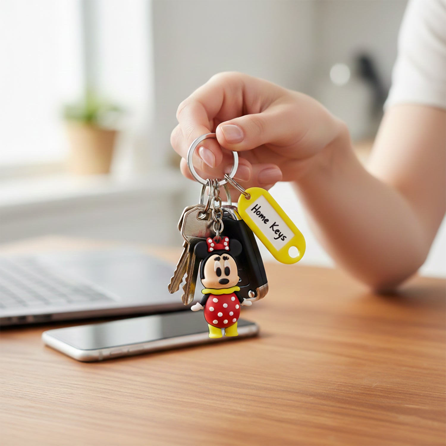 Colorful cartoon character keychain with a customizable name tag, featuring playful mixed design by Wukusy.