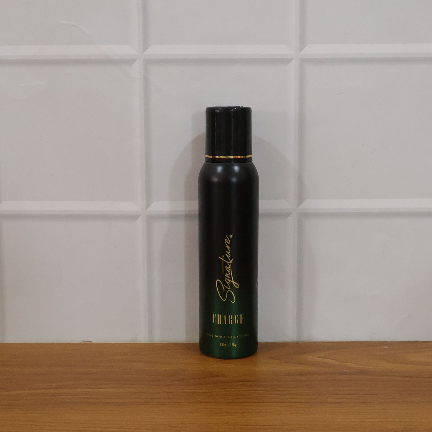 Wukusy Signature Premium Charge fragrance body spray 150ml bottle with sleek design on a neutral background