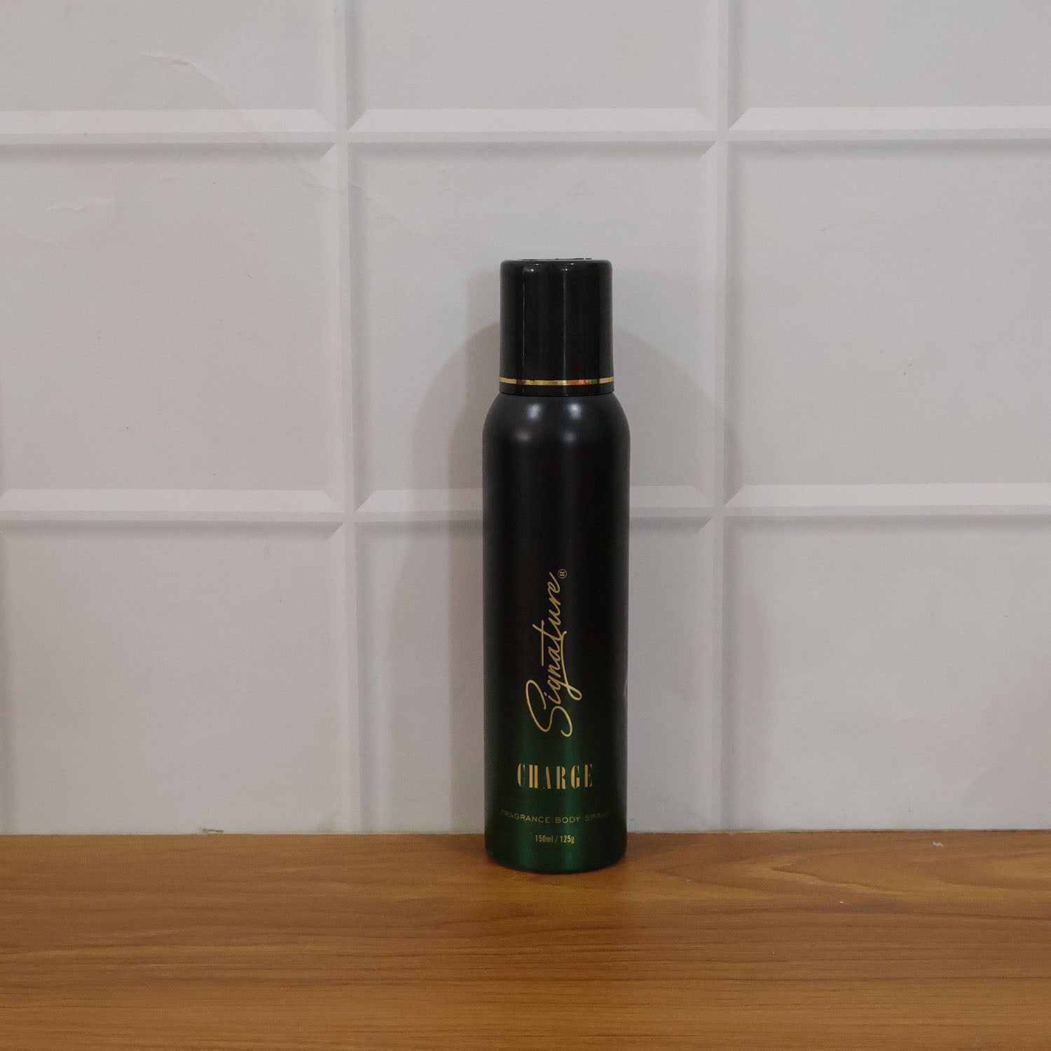 Wukusy Signature Premium Charge fragrance body spray 150ml bottle with sleek design on a neutral background