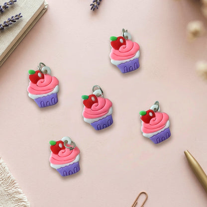 Set of 10 Wukusy cupcake-shaped bag charm keychains with colorful, cute dessert designs on a white background.