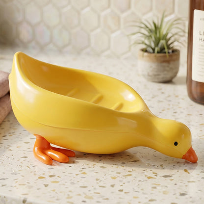 Cute duck-shaped plastic soap holder box for bathroom, designed for kids soap dishes, by Wukusy.