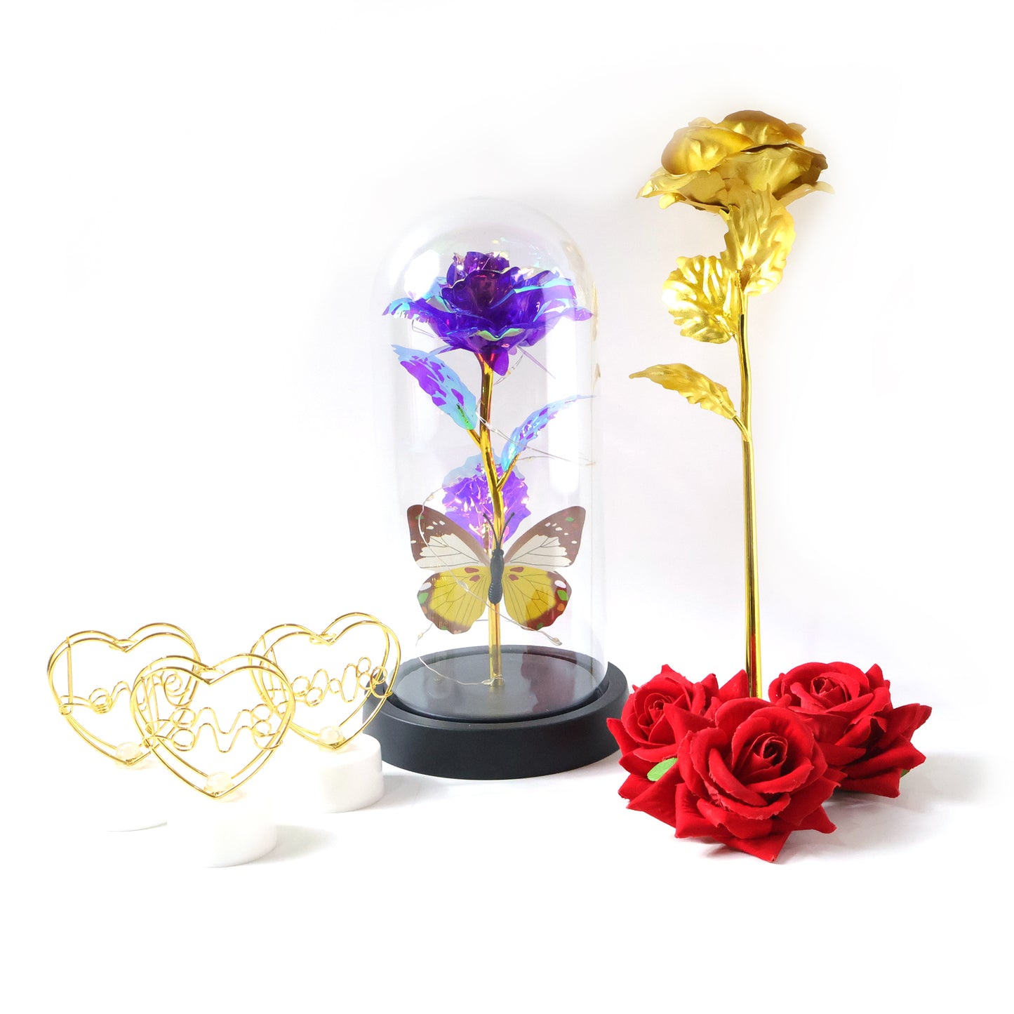 Romantic gift set by Wukusy featuring candles, chocolates, and flowers arranged for a special occasion, elegant presentation.