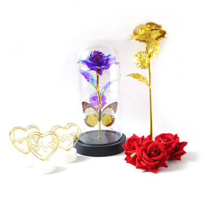 Romantic gift set by Wukusy featuring candles, chocolates, and flowers arranged for a special occasion, elegant presentation.