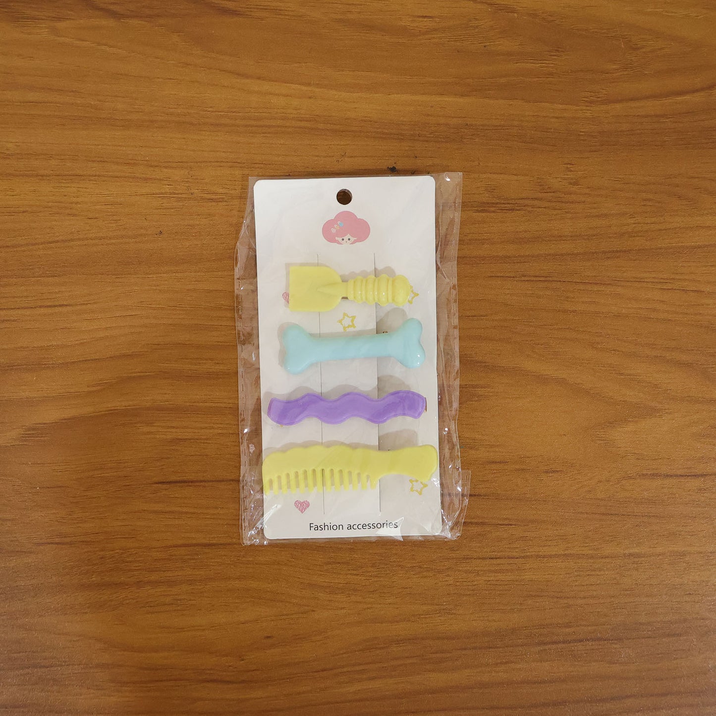 Set of four decorative alligator hair clips for girls and women by Wukusy, featuring cute styling pins in colorful designs.
