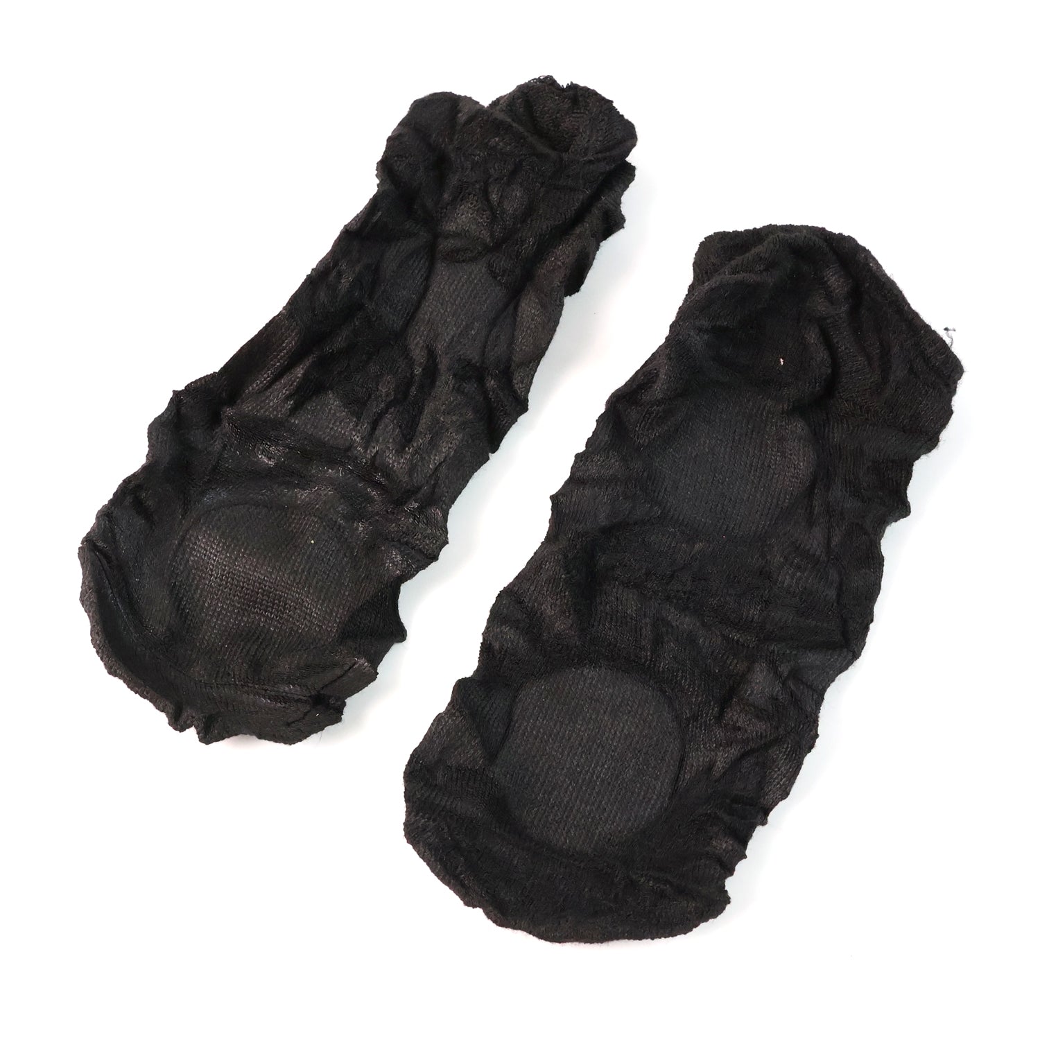 Pair of Wukusy no-show liner socks with anti-slip heel grip, showing a close-up of the soft fabric and heel grip detail.