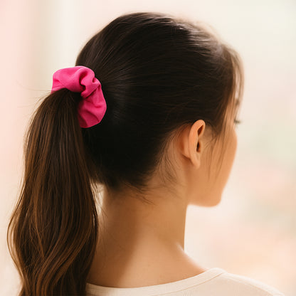Set of soft elastic hair scrunchies from Wukusy, showing multiple colorful fabric-covered hair ties.