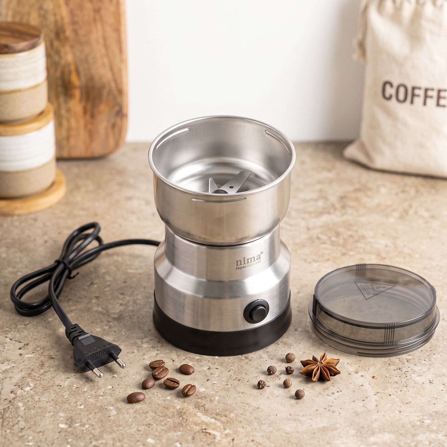 Wukusy mini electric grinder with stainless steel body and 150W motor for coffee, spices, and masala in a compact design