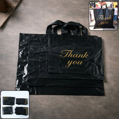 Set of four Black Wukusy Thank You printed carry bags in mixed sizes, perfect for gifting or shopping.