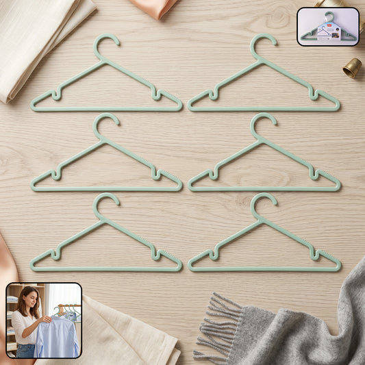 Six durable plastic Wukusy Apex Gripi cloth hangers for wardrobe organization, featuring a sturdy design for hanging clothes.