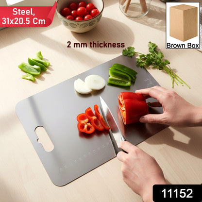Large stainless steel Wukusy chopping cutting board with a smooth, durable surface for food preparation.