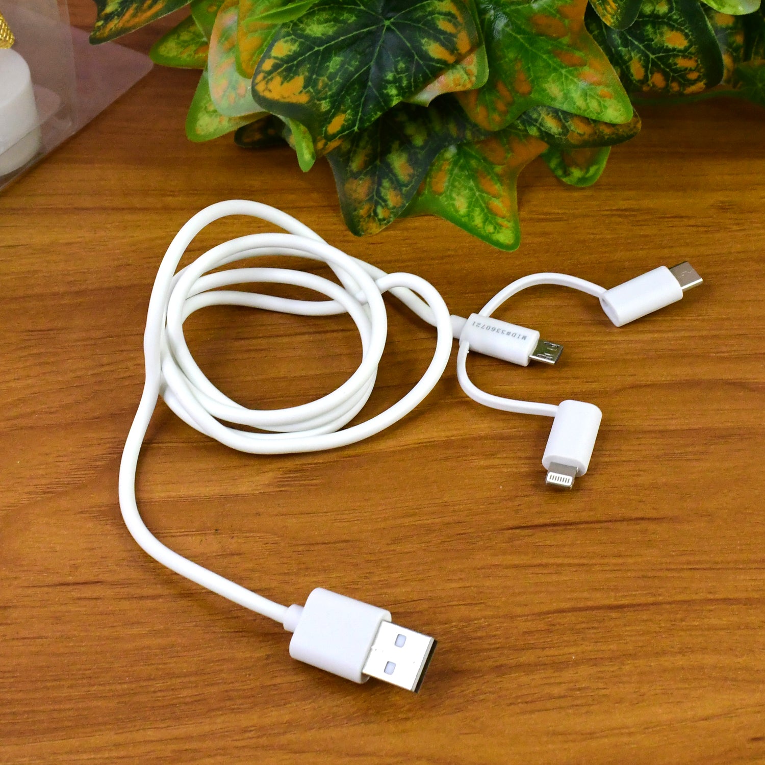 Wukusy 3-in-1 multi charging cable with USB, Lightning, and Type-C connectors for mobile devices on a white background.