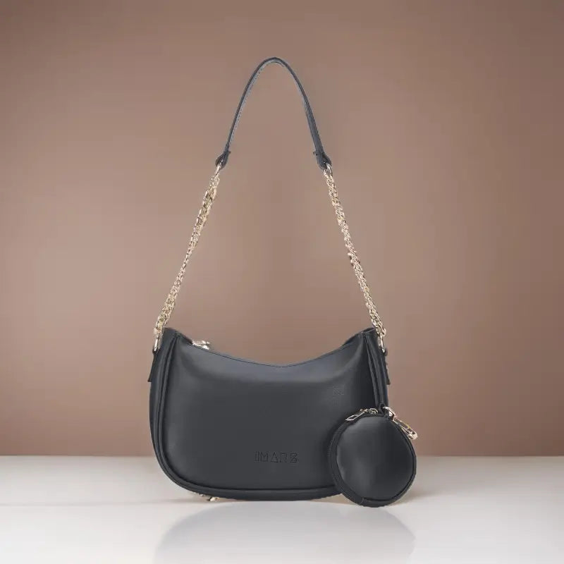 Small black classic chain shoulder bag by Ekom, made of vegan leather, designed for women and girls, with a sleek and stylish appearance.