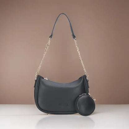 Small black classic chain shoulder bag by Ekom, made of vegan leather, designed for women and girls, with a sleek and stylish appearance.