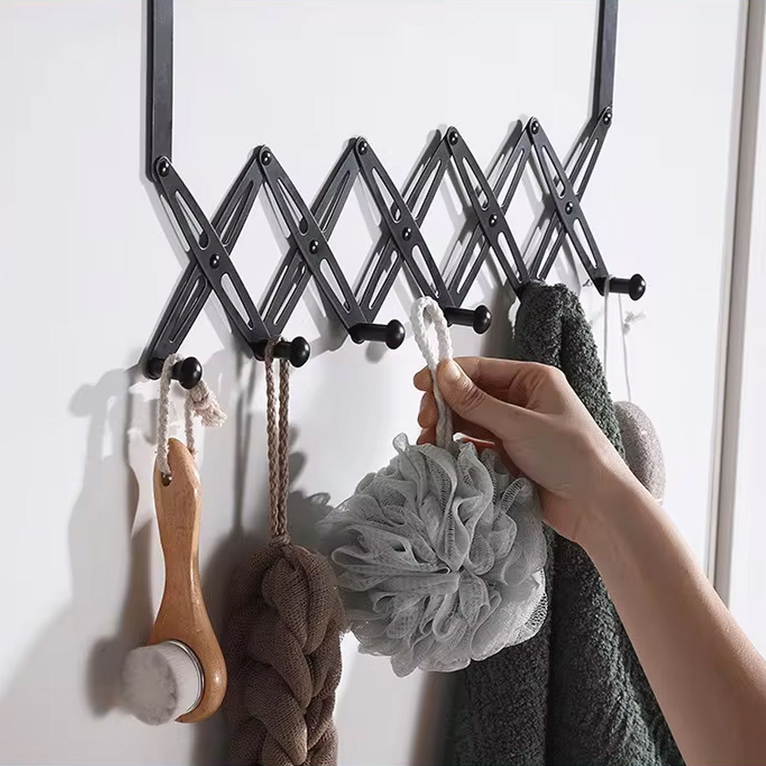 Steel door hook hanger with six hooks for coats and accessories, ideal for home organization by Wukusy.